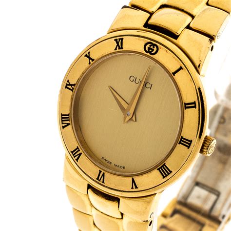 gold gucci watch for women.